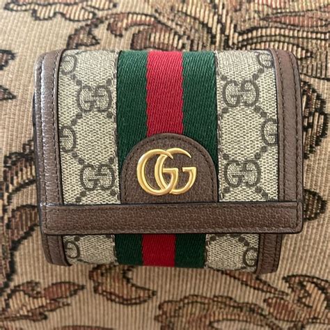 gucci tri fold case|Gucci GG tri.